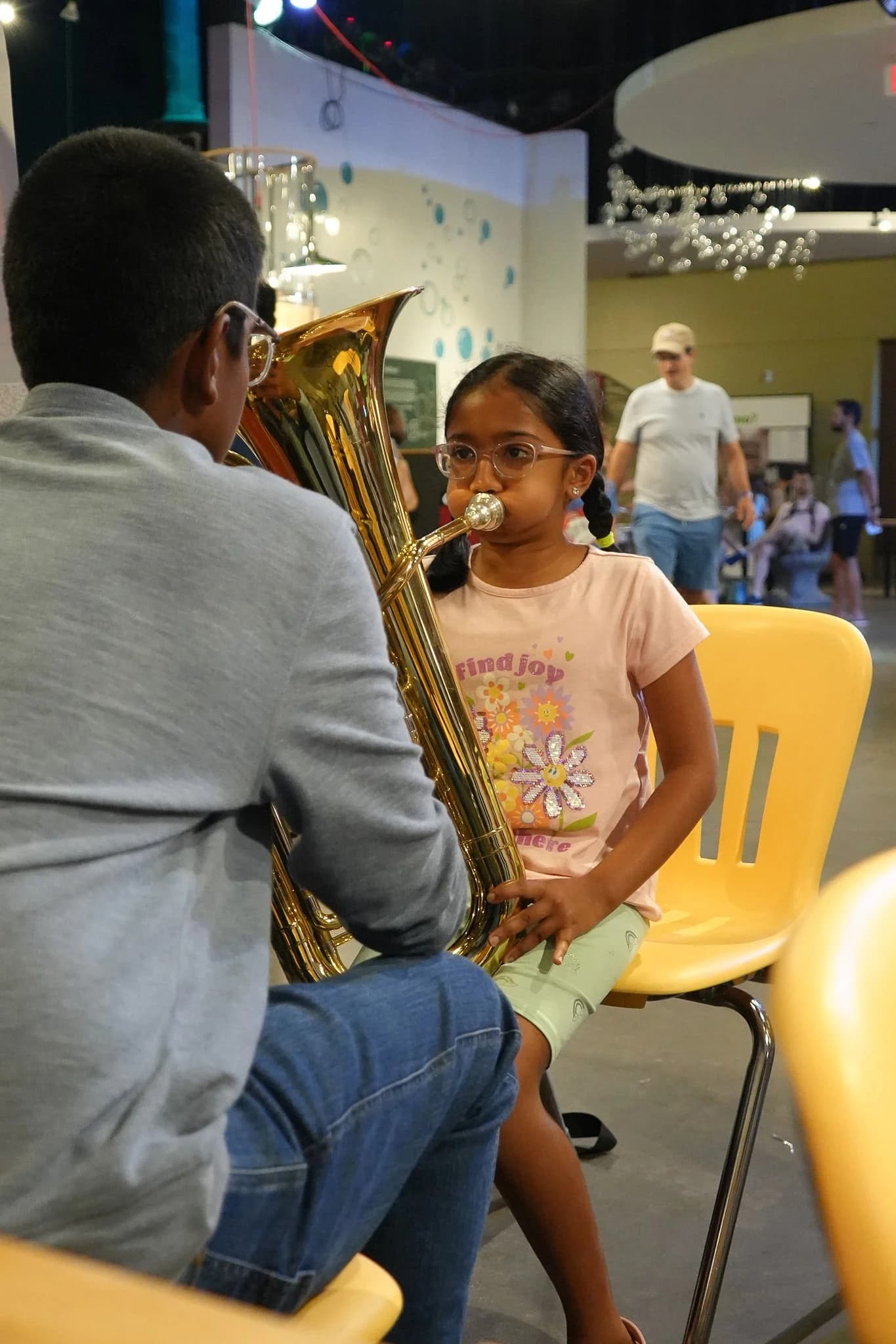 Student trying tuba